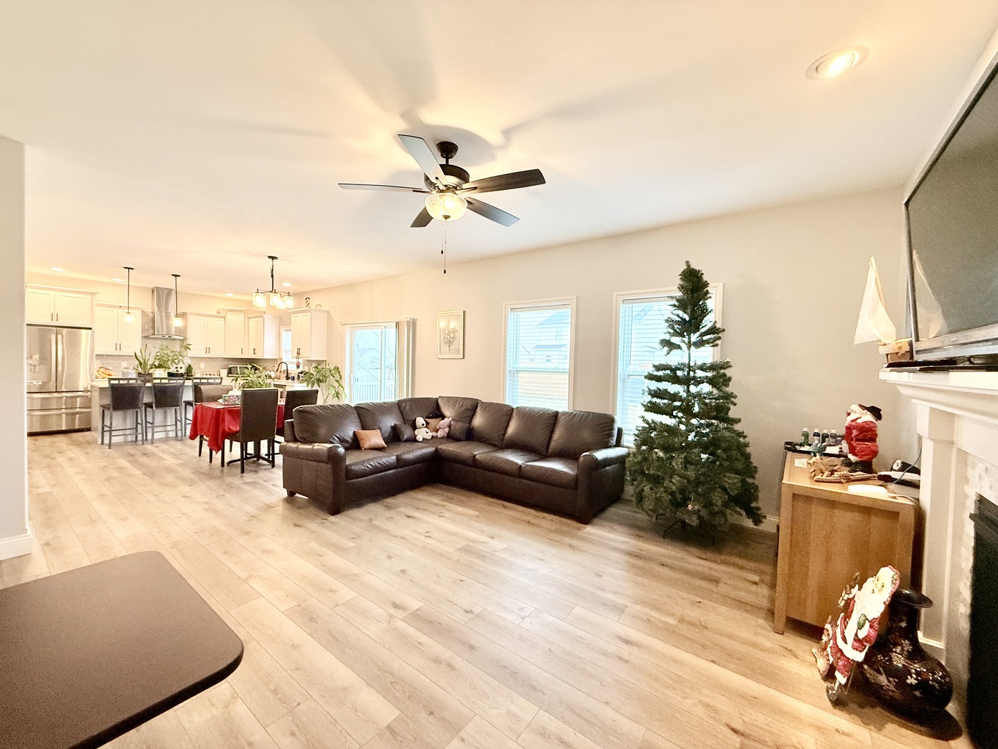 715 Rapp Drive Mahomet, IL 61853 - Photo 9 of 40 a living room with furniture and a chandelier