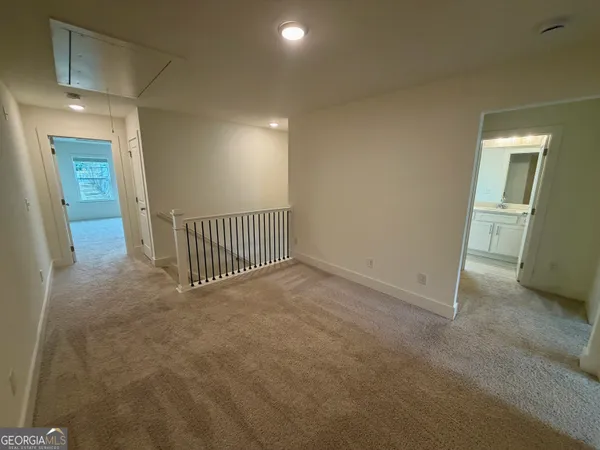 an empty room with windows