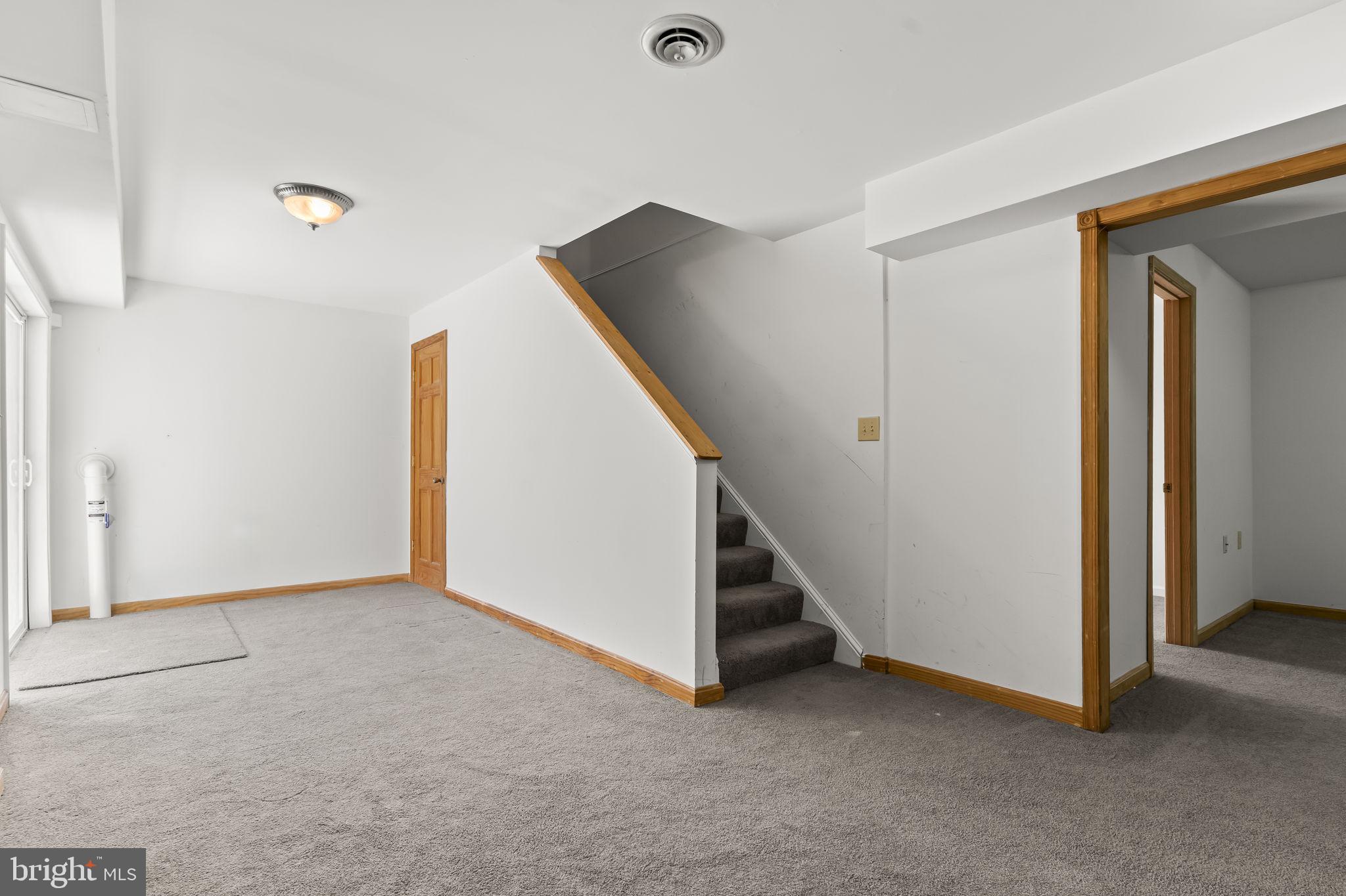532 Shortbow Trail Lusby, MD 20657 - Photo 20 of 33 a view of an empty room with stairs