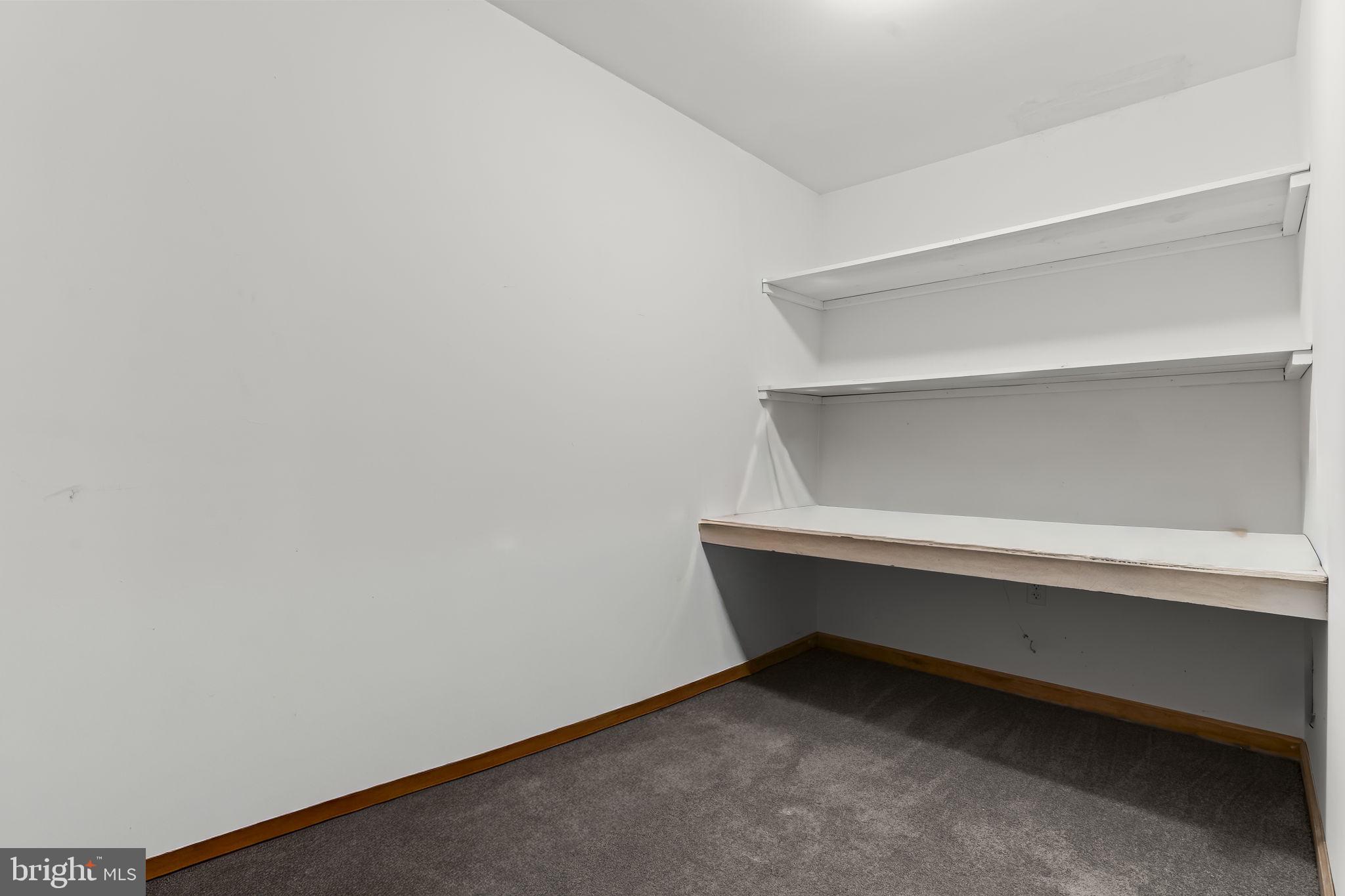 532 Shortbow Trail Lusby, MD 20657 - Photo 28 of 33 a room with a bench