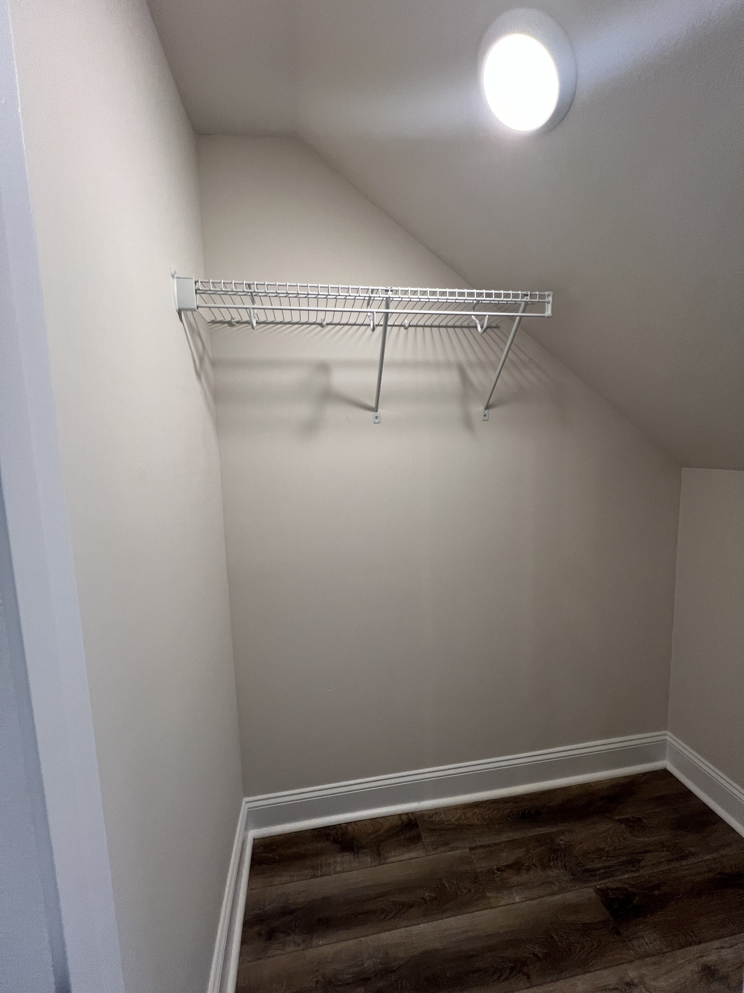 550 Peachers Mill Road, Unit B5 Clarksville, TN 37042 - Photo 12 of 33 a view of a room with racks on the wall