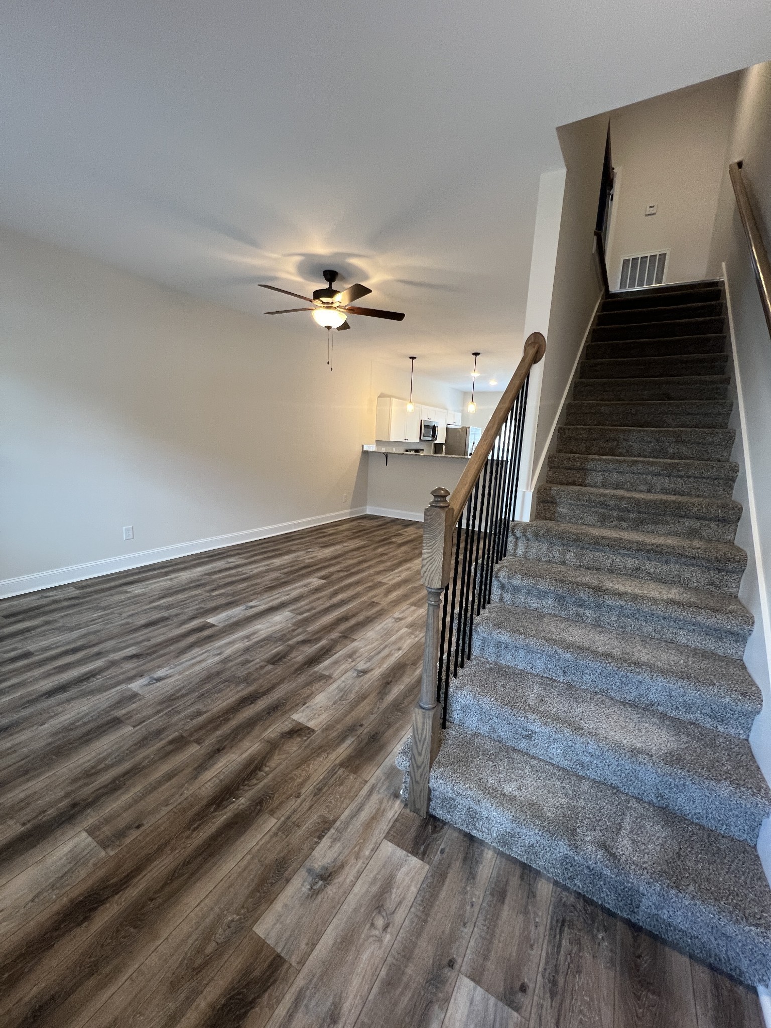 550 Peachers Mill Road, Unit B5 Clarksville, TN 37042 - Photo 2 of 33 a view of entryway and hall with wooden floor