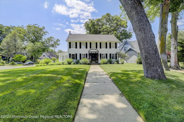 a view of a yard in front of house with a yard