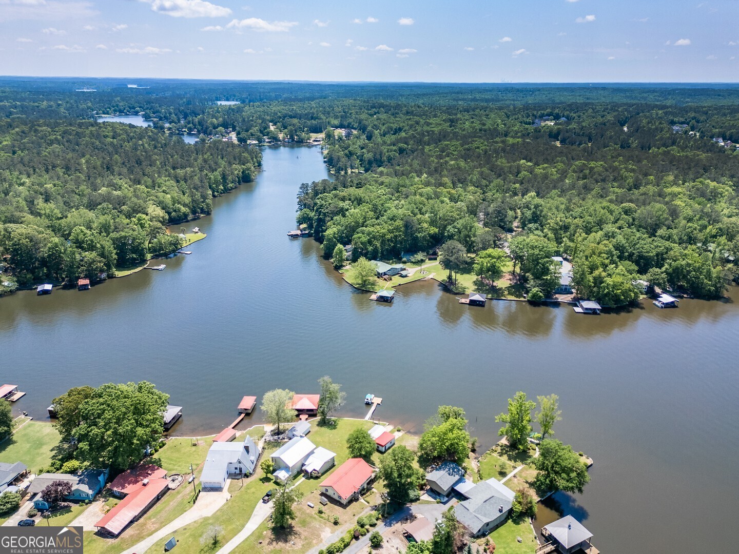 114 Mabry Road Jackson, GA 30233 - Photo 11 of 57 an aerial view of lake and residential houses with outdoor space
