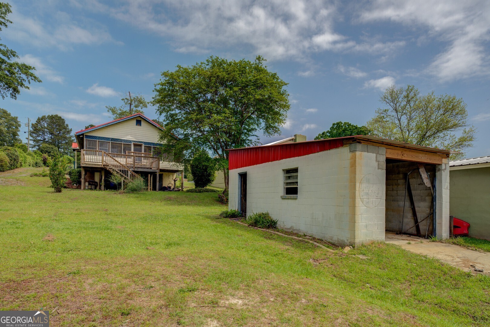 114 Mabry Road Jackson, GA 30233 - Photo 23 of 57 a view of a house with a backyard