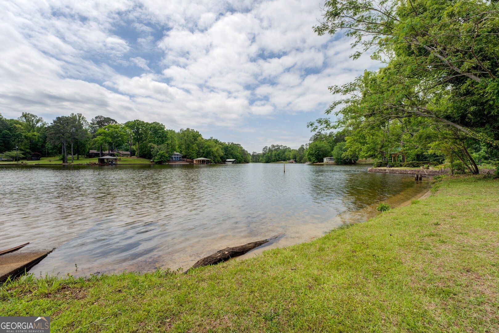 114 Mabry Road Jackson, GA 30233 - Photo 26 of 57 a body of water with a tree in the background
