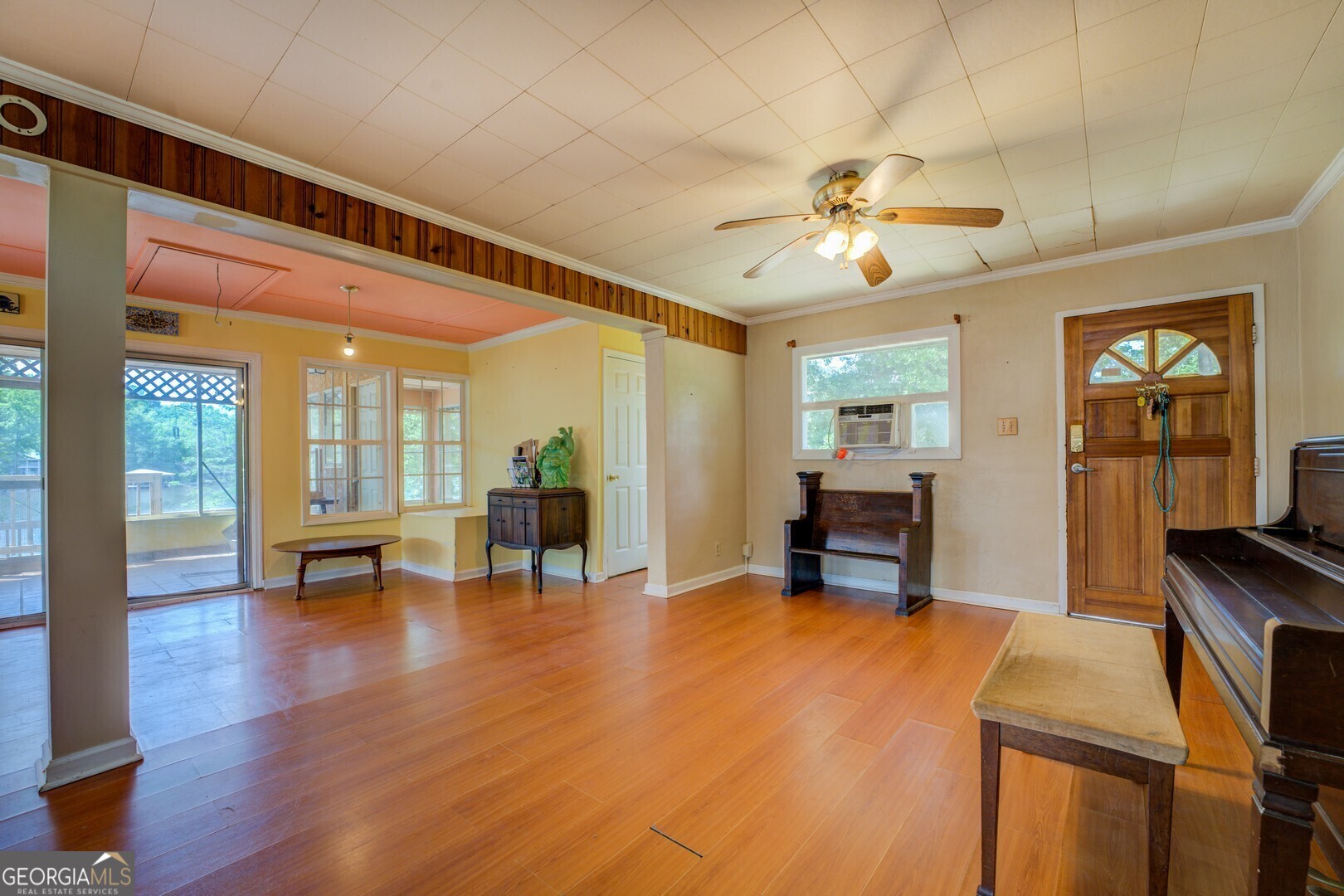 114 Mabry Road Jackson, GA 30233 - Photo 32 of 57 a living room with furniture and wooden floor
