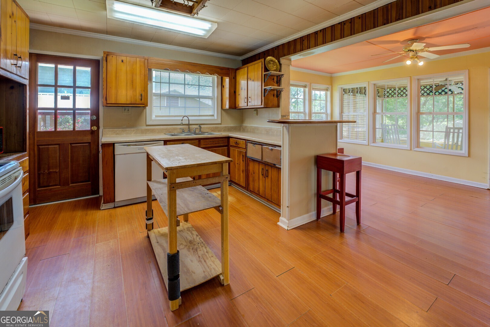 114 Mabry Road Jackson, GA 30233 - Photo 39 of 57 a kitchen with stainless steel appliances granite countertop a stove a sink and a refrigerator