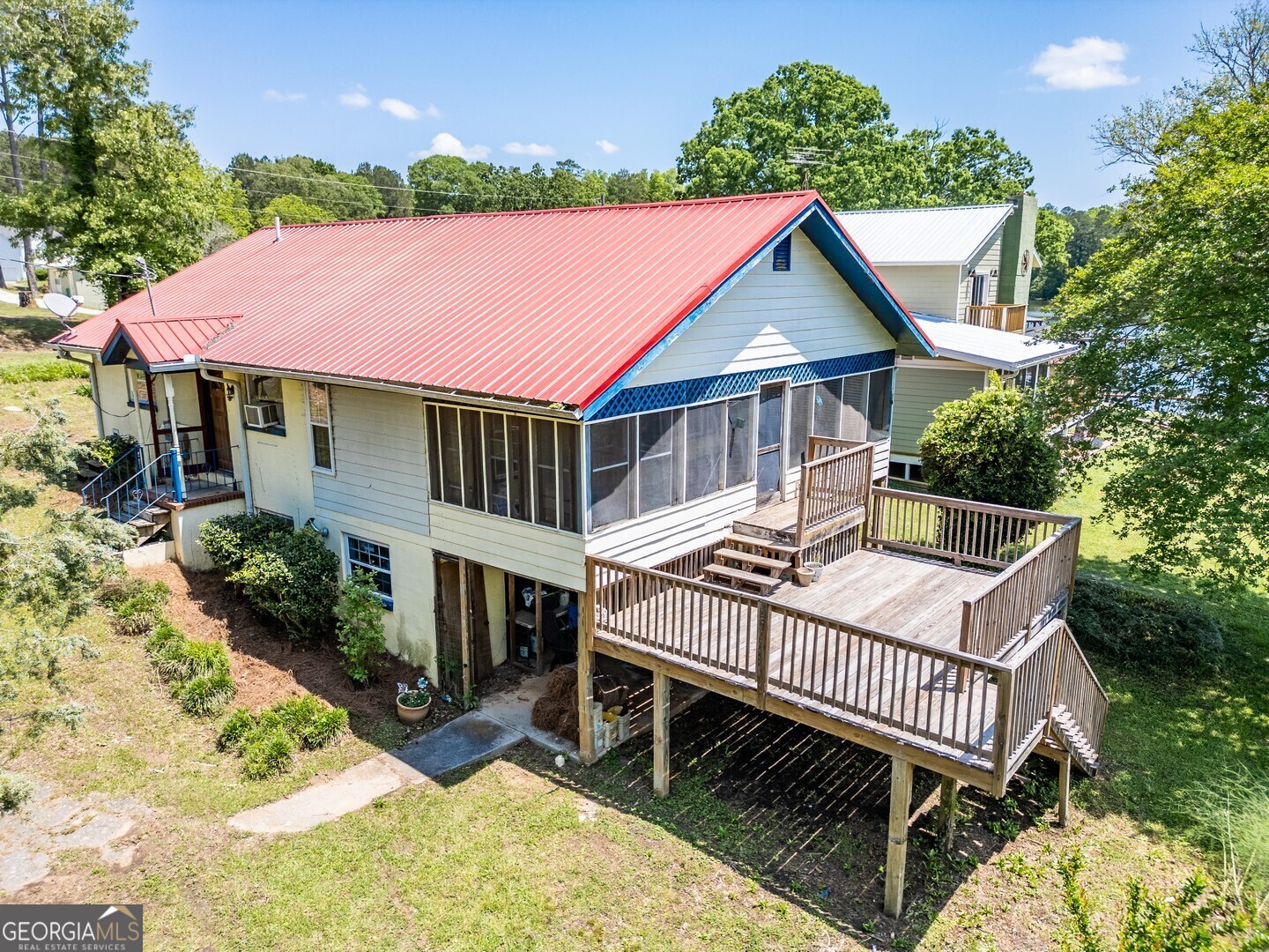 114 Mabry Road Jackson, GA 30233 - Photo 4 of 57 an aerial view of a house with a yard deck and furniture