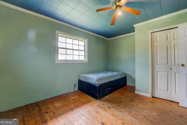 a view of a room with a large window