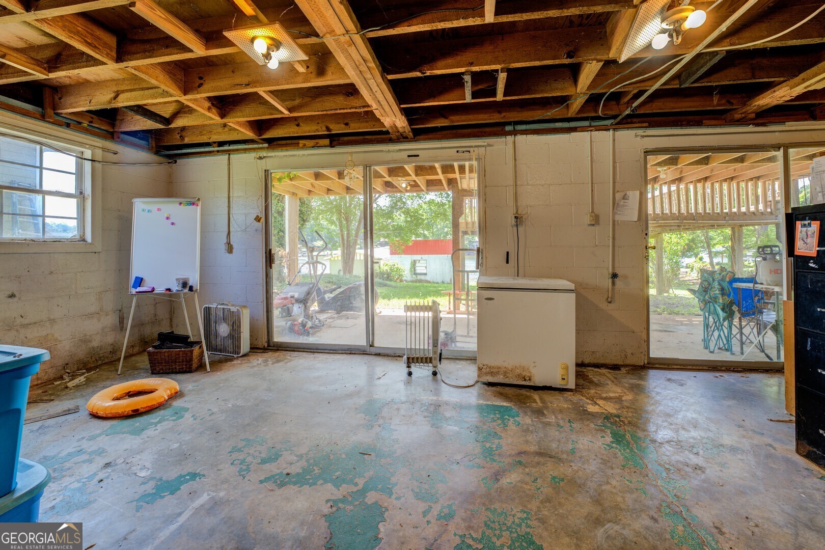 114 Mabry Road Jackson, GA 30233 - Photo 53 of 57 a view of a room with gym equipment and a large window