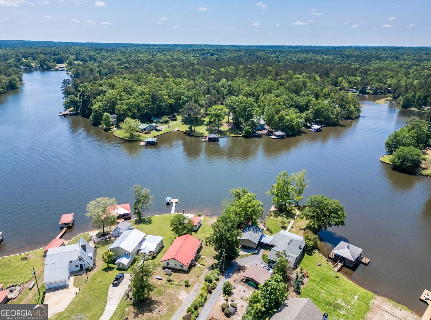 114 Mabry Road Jackson, GA 30233 - Photo 9 of 57 an aerial view of a house with a yard and lake view