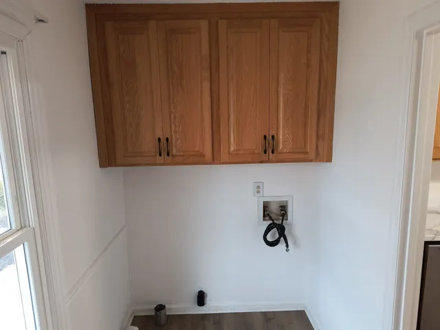 a bathroom with a sink toilet and vanity