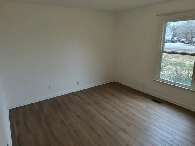 an empty room with a window