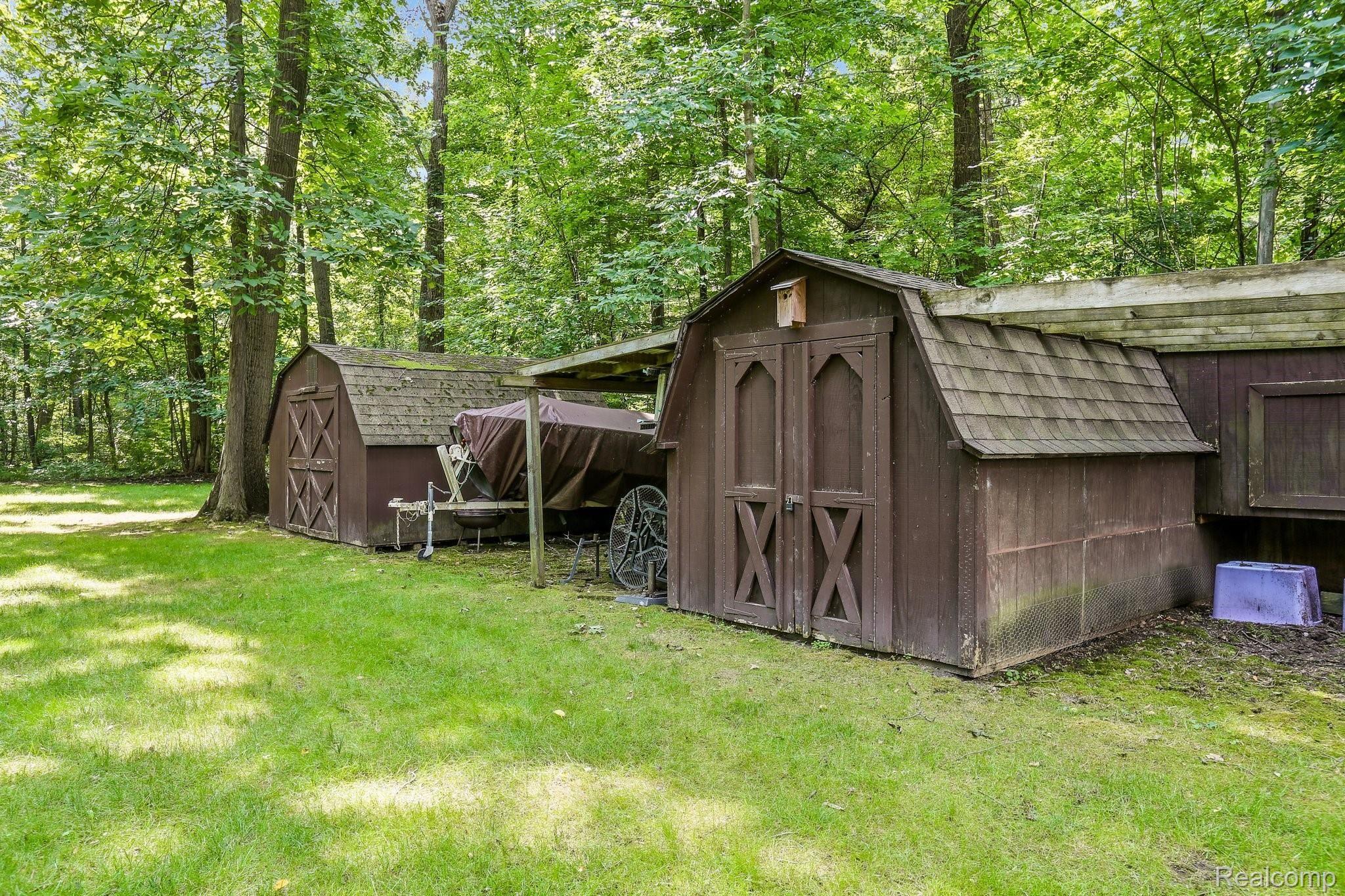5118 Golf Club Road Howell, MI 48843 - Photo 33 of 40 Two sheds