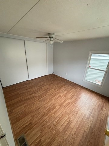 56 Dot's Lane Wareham, MA 02558 - Photo 16 of 28 a view of empty room with wooden floor
