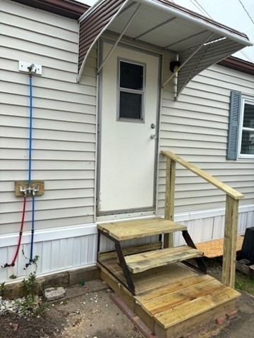 56 Dot's Lane Wareham, MA 02558 - Photo 21 of 28 a view of a patio with a table and chairs