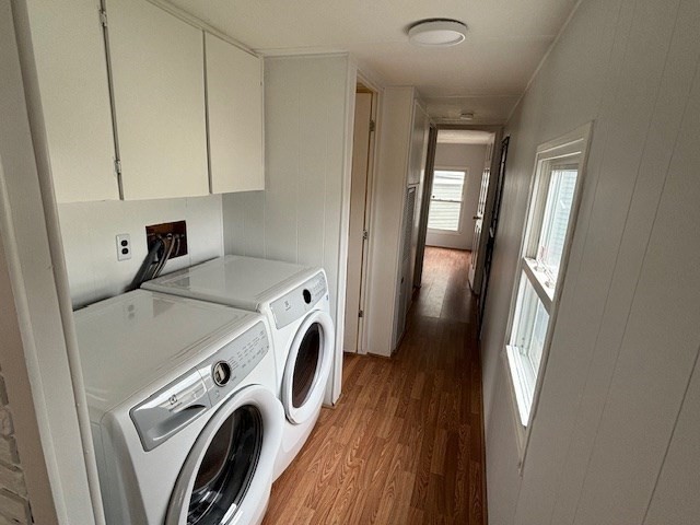 56 Dot's Lane Wareham, MA 02558 - Photo 10 of 28 a view of washer and dryer with kitchen in the background