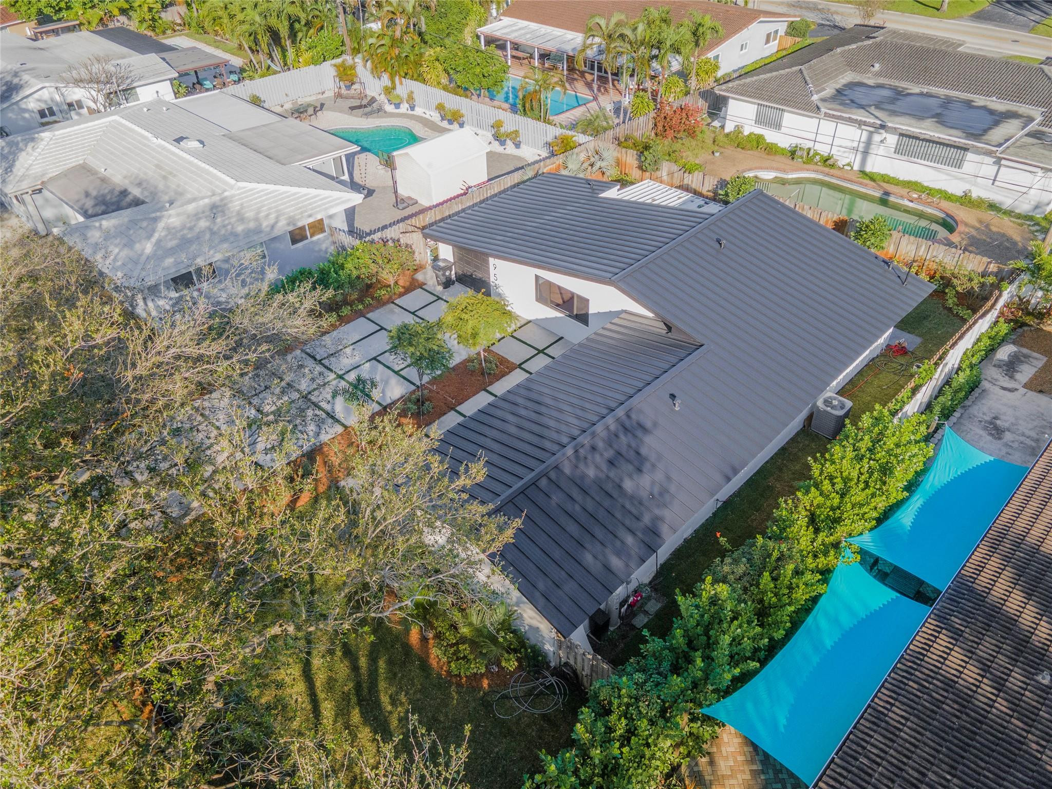 1951 Northeast 28th Court Lighthouse Point, FL 33064 - Photo 27 of 34 an aerial view of a house