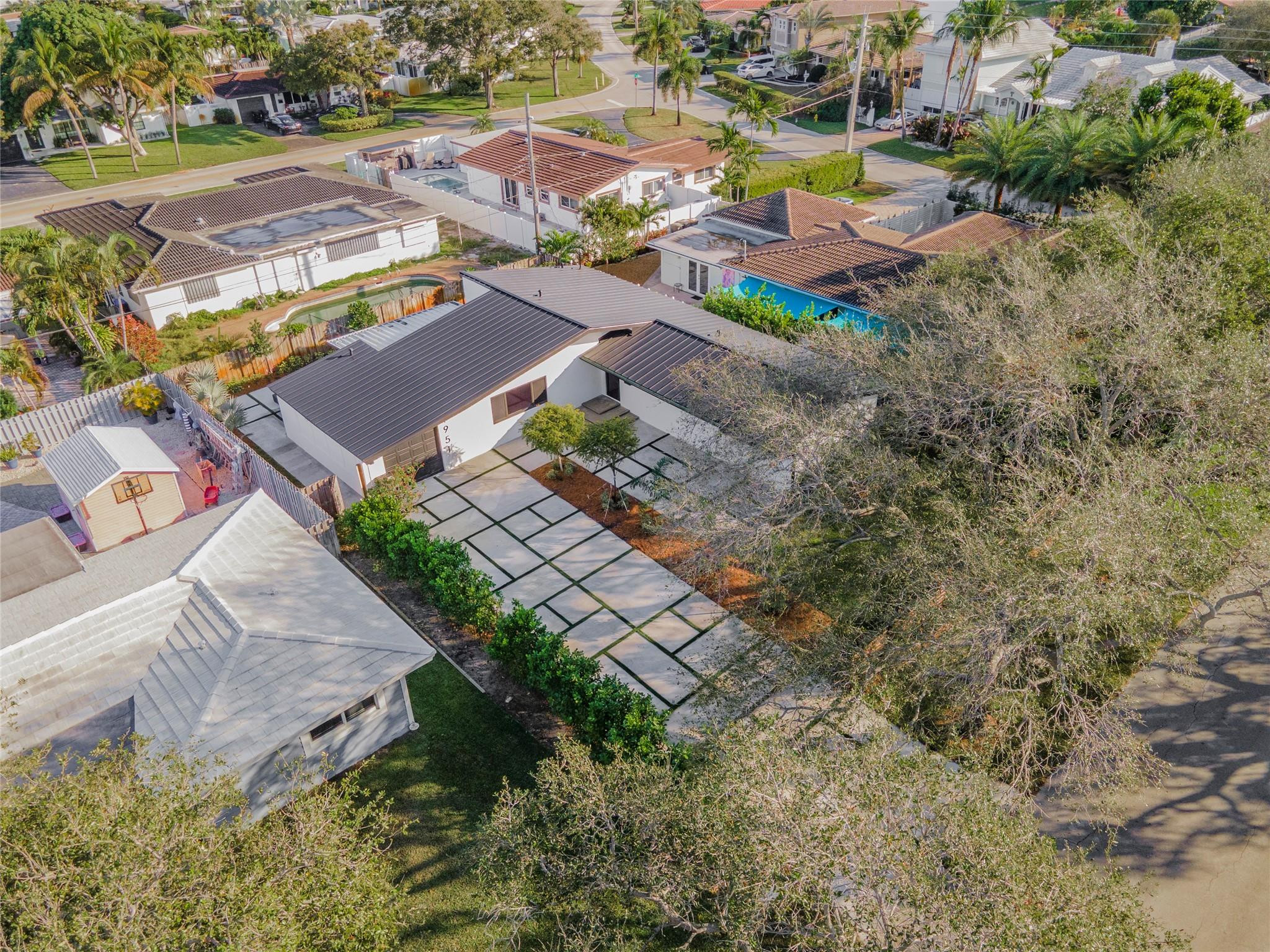 1951 Northeast 28th Court Lighthouse Point, FL 33064 - Photo 28 of 34 an aerial view of residential houses with outdoor space