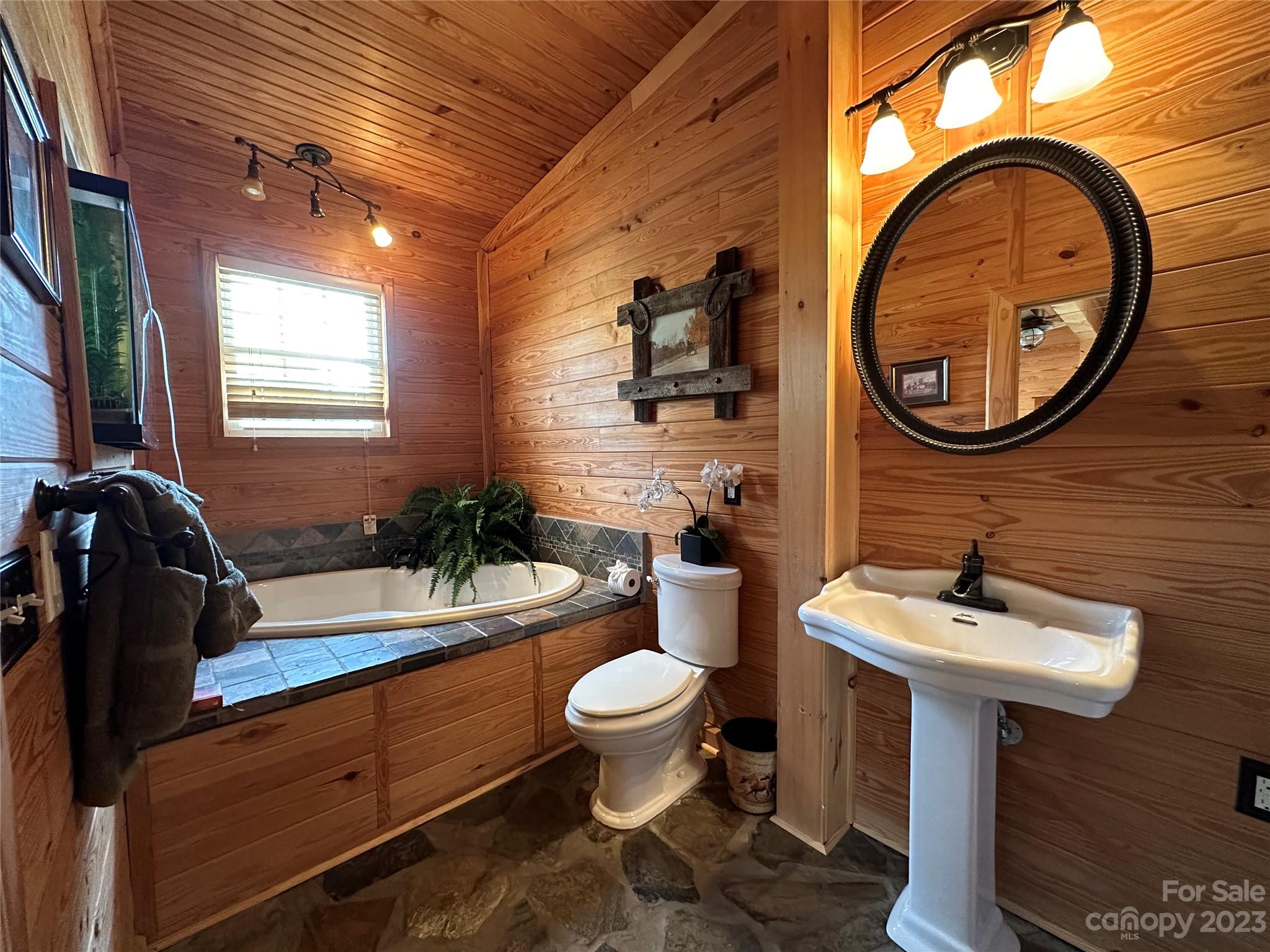 3613 Austin Road Monroe, NC 28112 - Photo 17 of 46 a bathroom with a toilet sink and mirror