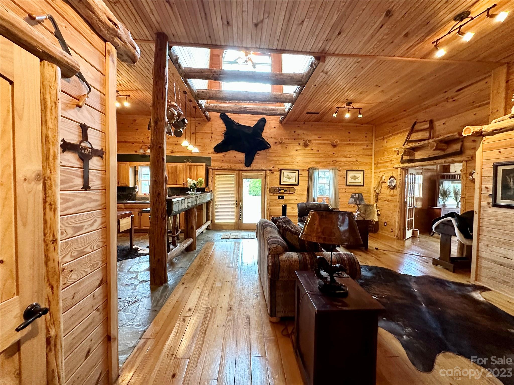 3613 Austin Road Monroe, NC 28112 - Photo 10 of 46 a view of a room with lots of wooden furniture and windows