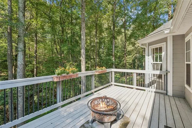 a view of a balcony with furniture
