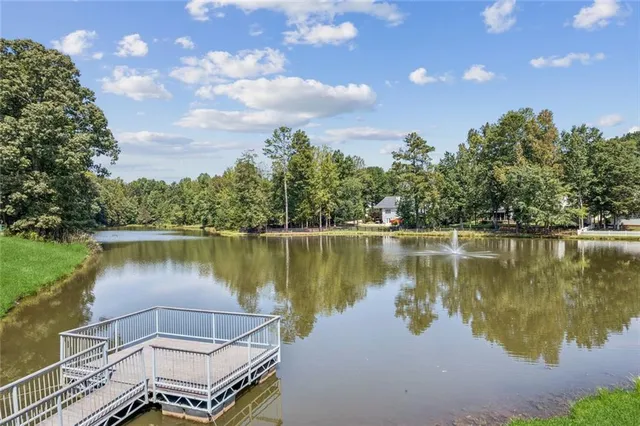 a view of a lake with a outdoor space