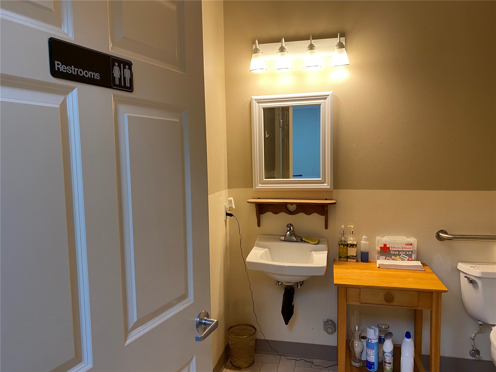 212 West Winesap Road, Unit 104 Bothell, WA 98012 - Photo 11 of 13 a bathroom with a sink and mirror