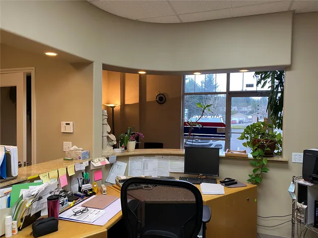 a room with furniture and a large window
