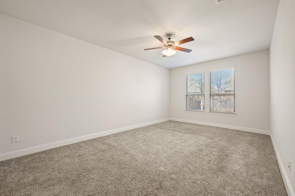 10920 Calvert Place McKinney, TX 75071 - Photo 15 of 37 a view of an empty room with a window