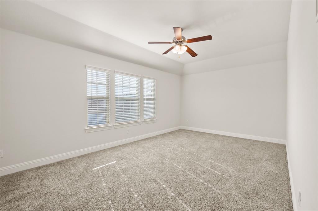 10920 Calvert Place McKinney, TX 75071 - Photo 22 of 37 a view of an empty room with a window