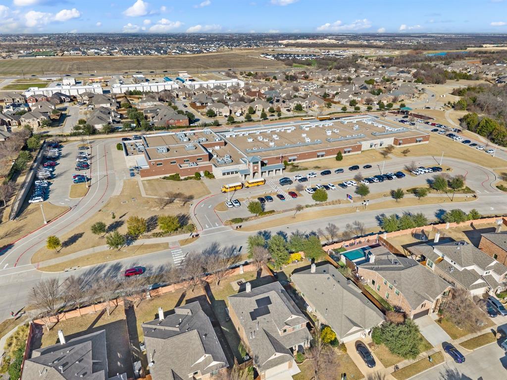 10920 Calvert Place McKinney, TX 75071 - Photo 32 of 37 an aerial view of a city