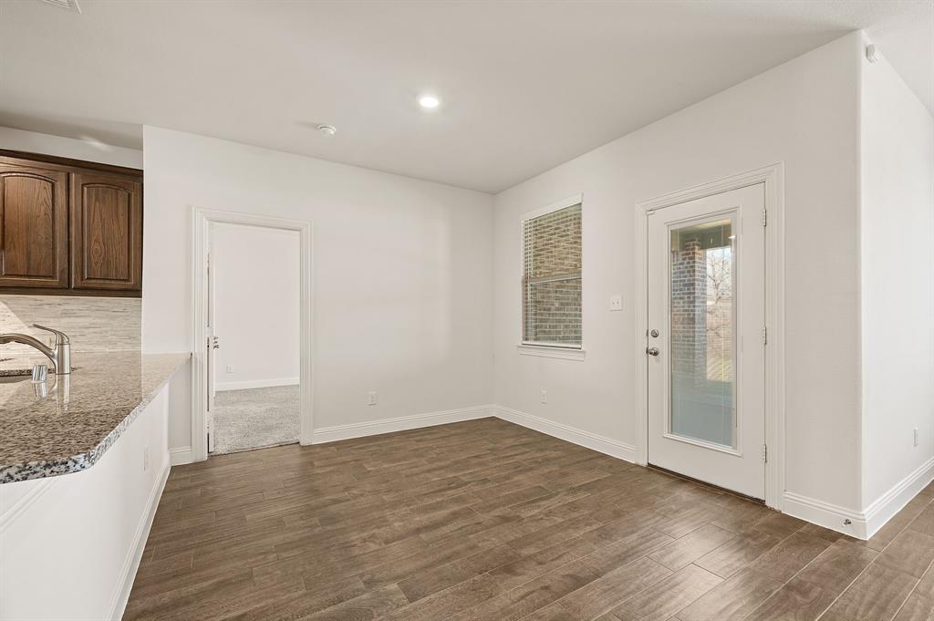 10920 Calvert Place McKinney, TX 75071 - Photo 9 of 37 a view of a kitchen cabinets a sink and dishwasher in a kitchen