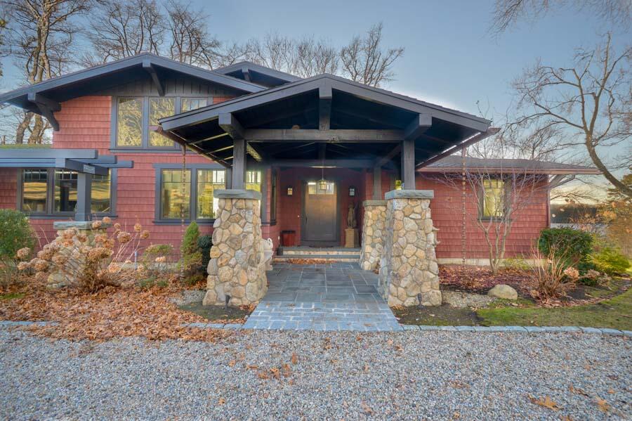 351 Huckins Neck Road Centerville, MA 02632 - Photo 2 of 55 a front view of a house with garden