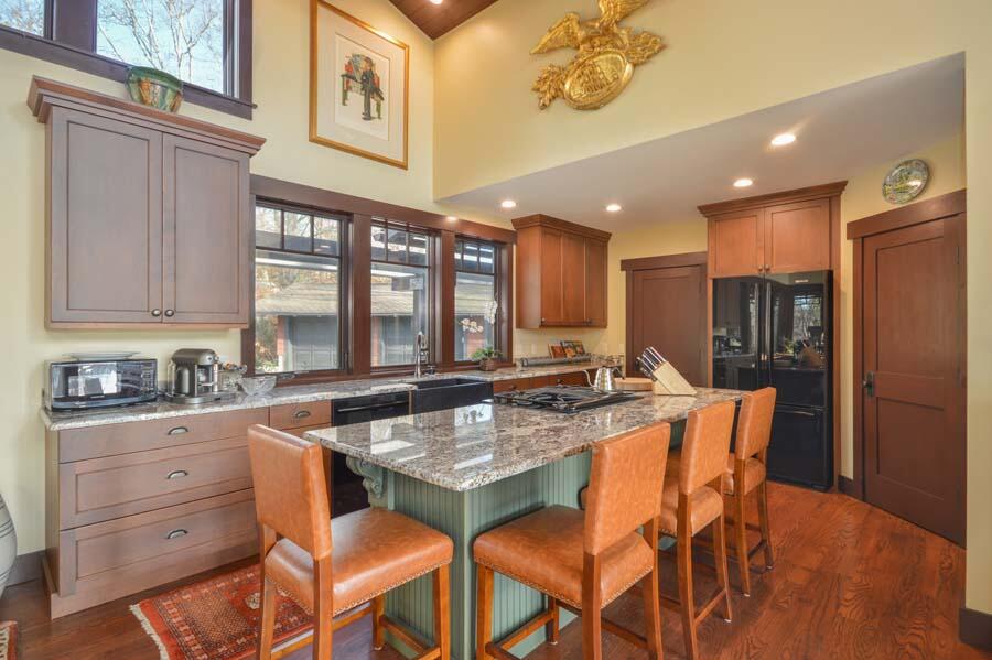 351 Huckins Neck Road Centerville, MA 02632 - Photo 26 of 55 a kitchen with a stove a sink and cabinets