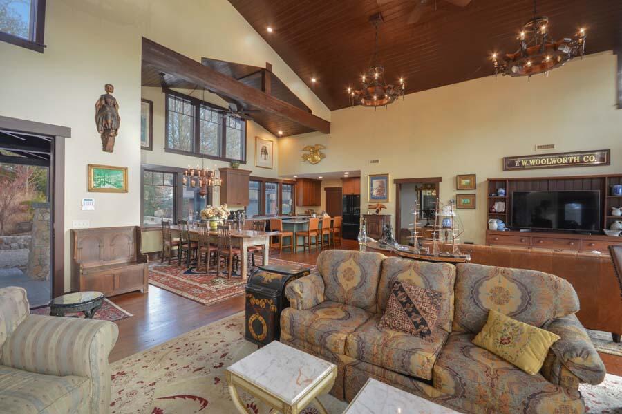 351 Huckins Neck Road Centerville, MA 02632 - Photo 32 of 55 a living room with furniture and a fireplace