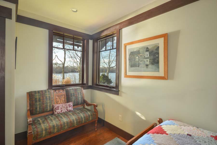 351 Huckins Neck Road Centerville, MA 02632 - Photo 39 of 55 a living room with furniture and a window
