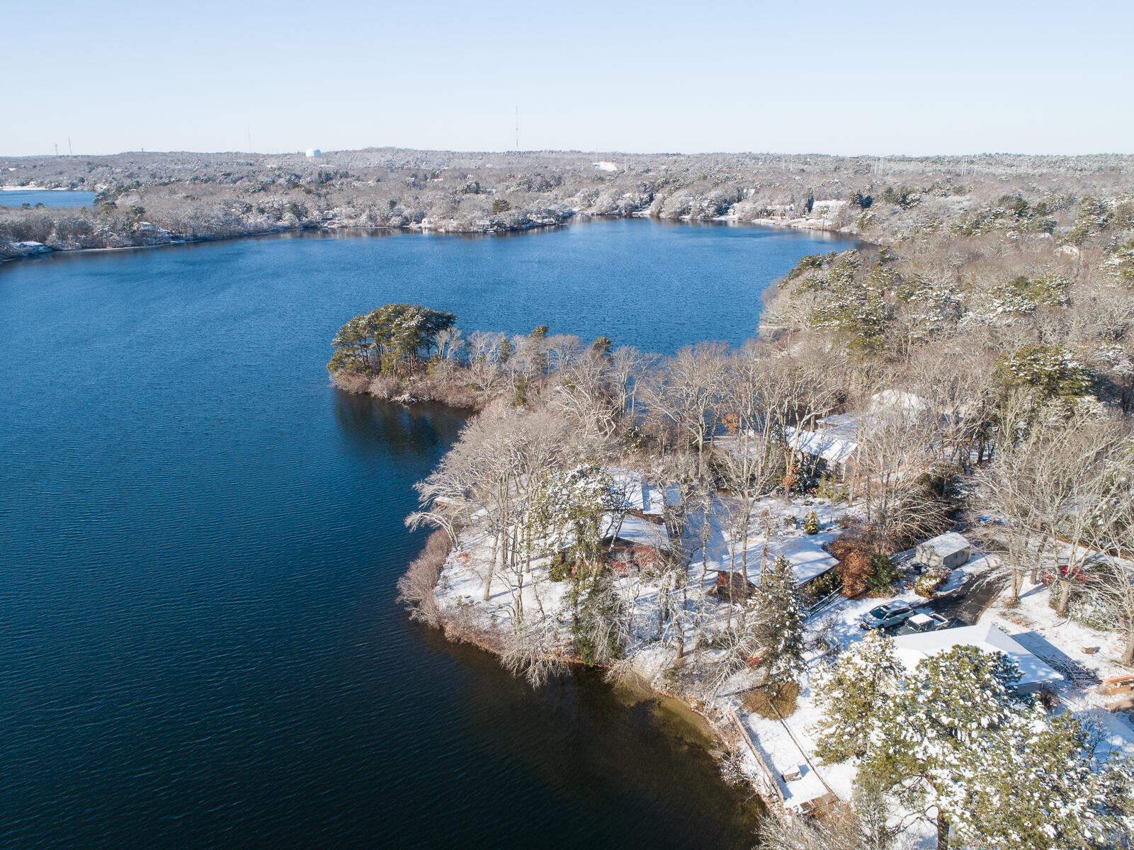 351 Huckins Neck Road Centerville, MA 02632 - Photo 4 of 55 an aerial view of a house with a yard