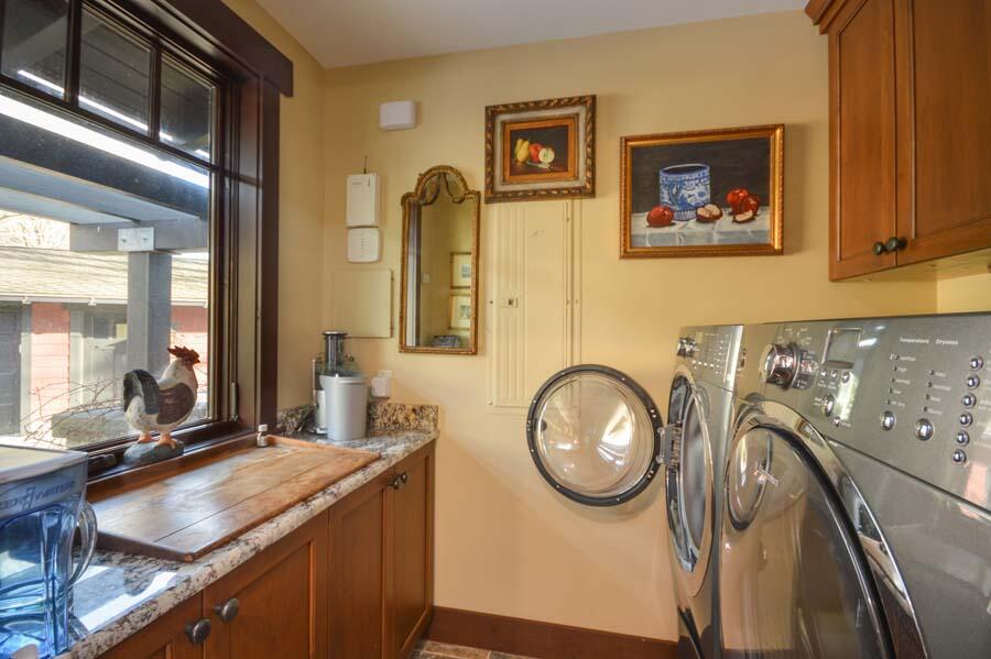 351 Huckins Neck Road Centerville, MA 02632 - Photo 41 of 55 a bathroom with a sink and a mirror