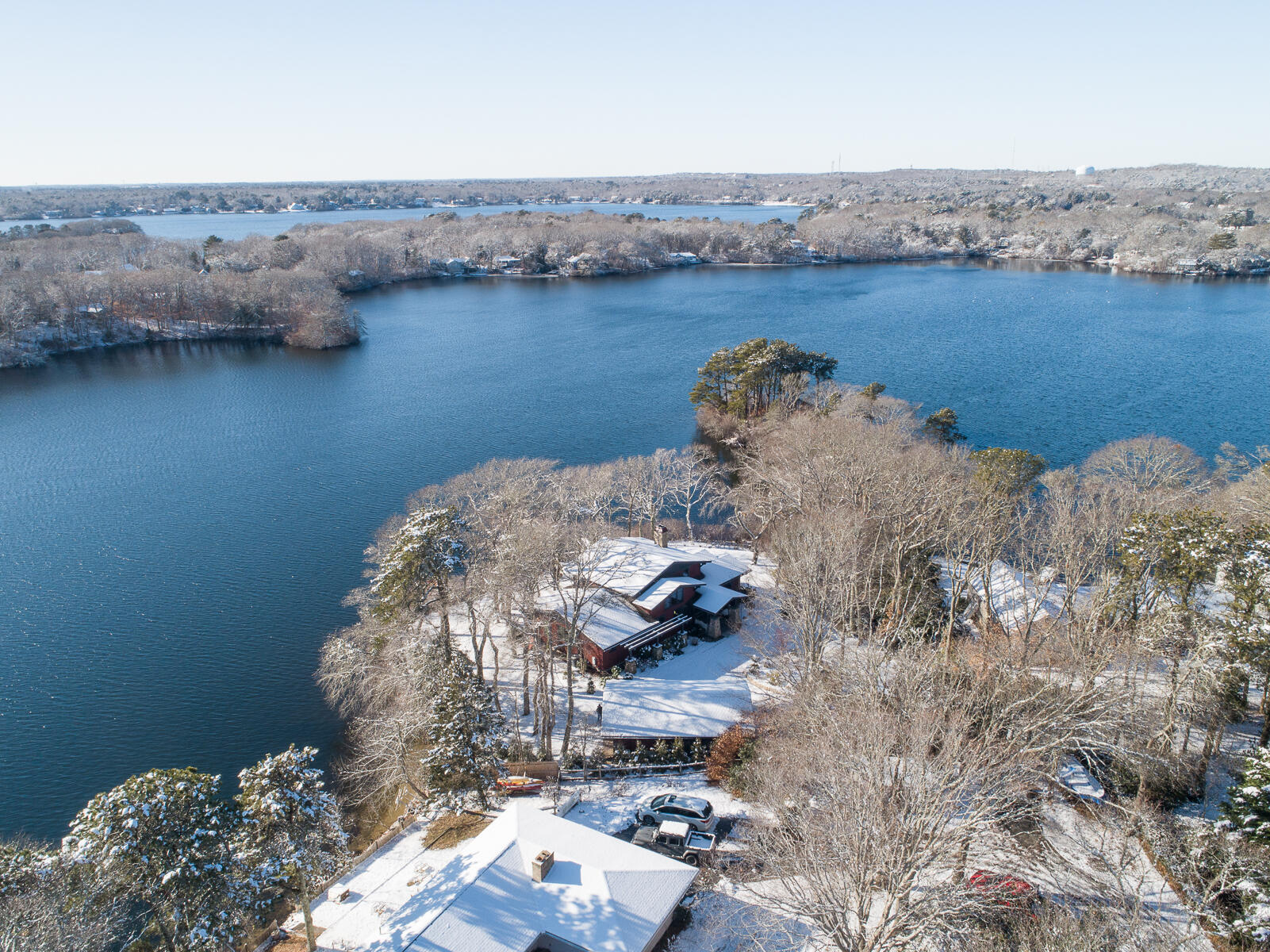 351 Huckins Neck Road Centerville, MA 02632 - Photo 5 of 55 an aerial view of a house with a lake view