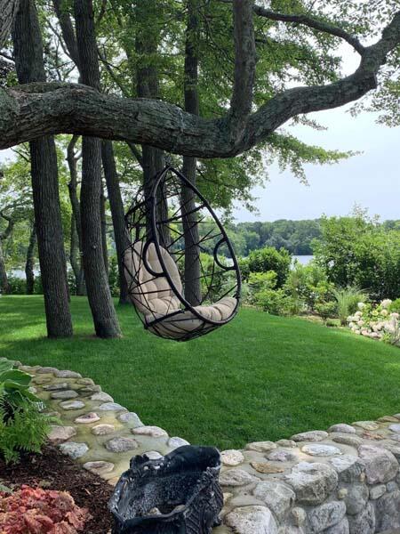 351 Huckins Neck Road Centerville, MA 02632 - Photo 53 of 55 a view of a backyard with large trees