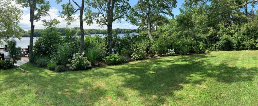 351 Huckins Neck Road Centerville, MA 02632 - Photo 54 of 55 a view of an outdoor space and a yard