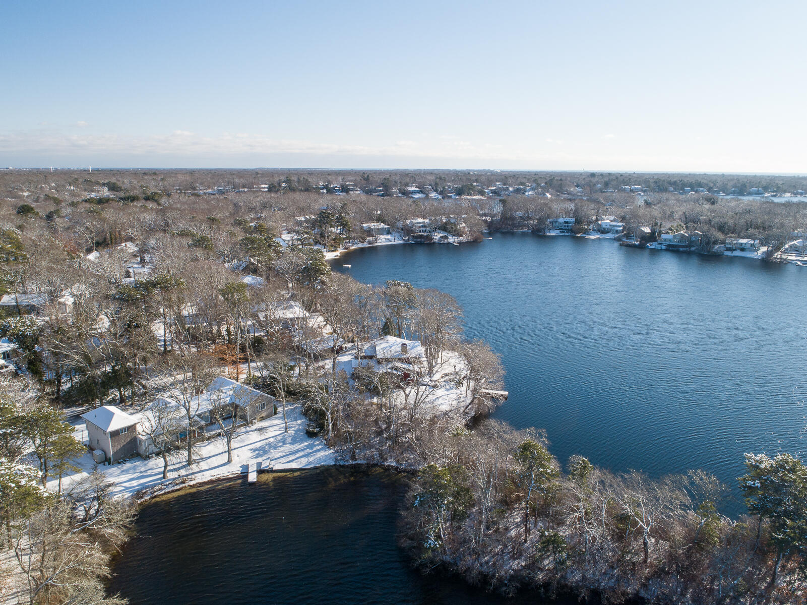 351 Huckins Neck Road Centerville, MA 02632 - Photo 9 of 55 an aerial view of a house with a lake view