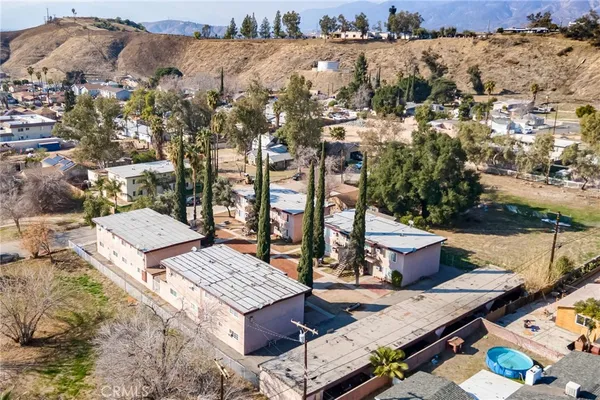 an aerial view of a house with a garden