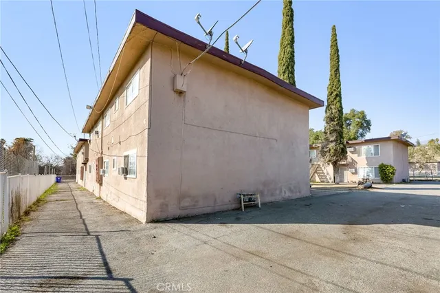 a view of a house with a street