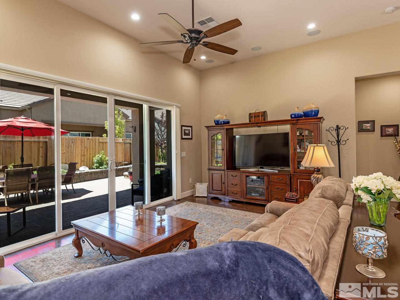 9455 Baldacci Road Reno, NV 89521 - Photo 12 of 22 a living room with furniture and a flat screen tv