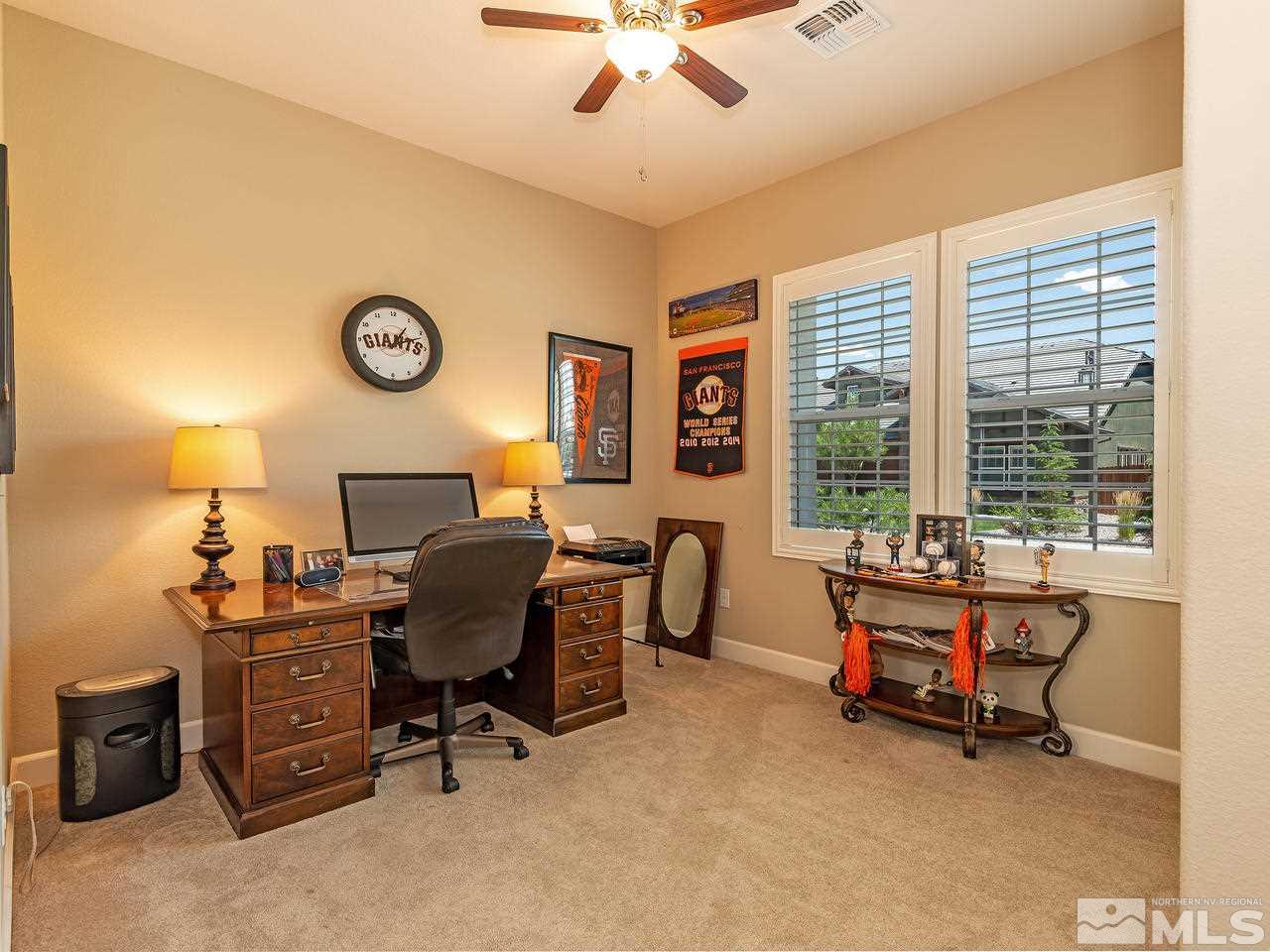 9455 Baldacci Road Reno, NV 89521 - Photo 18 of 22 a view of a workspace with furniture and a window