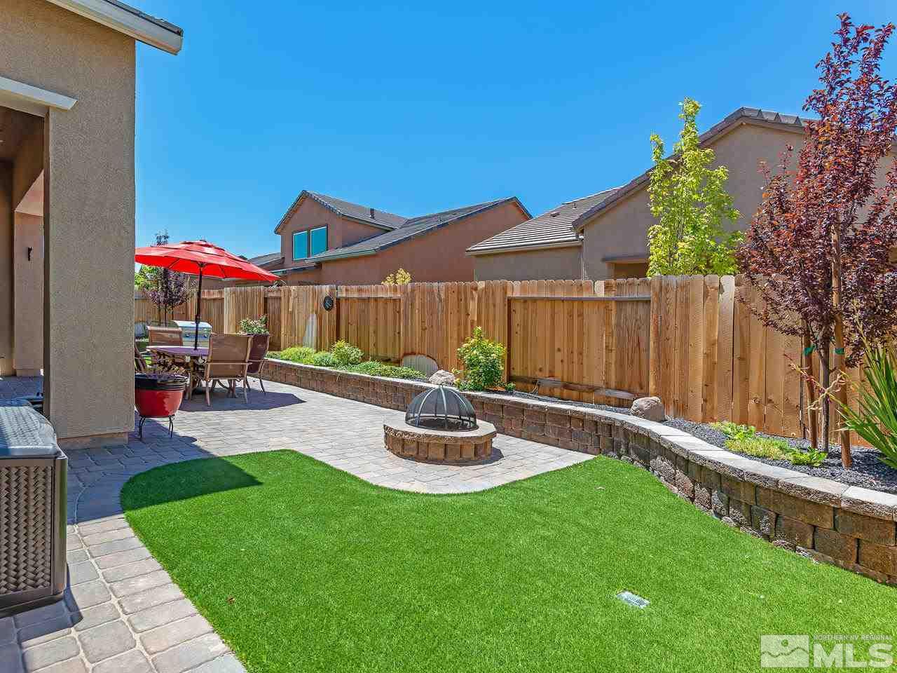 9455 Baldacci Road Reno, NV 89521 - Photo 4 of 22 a front view of house with a garden