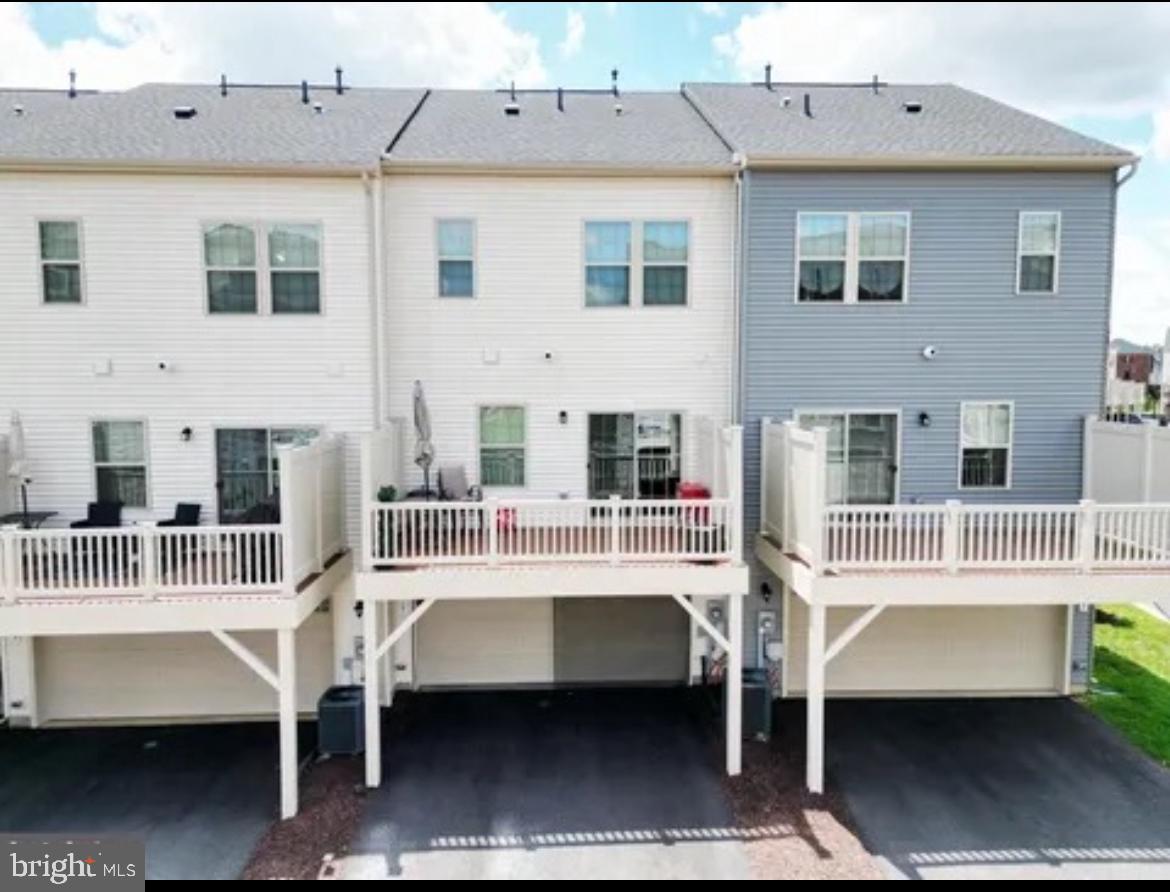 8002 General Greene Street Brandywine, MD 20613 - Photo 16 of 16 a view of a balcony with table and chairs